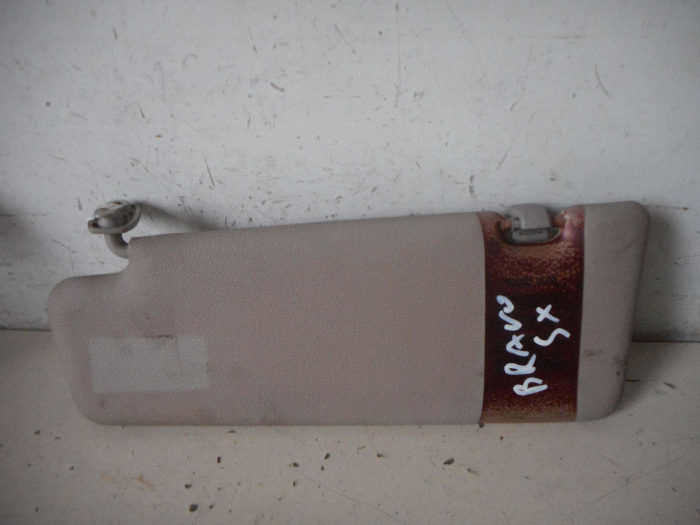 Aletta parasole parabrezza sx.